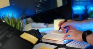 Web development freelancing 2026 guide showing developer working remotely on laptop